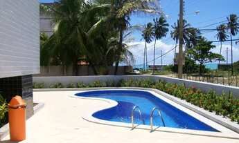 Imagem 5: Quarto e sala com vista para o mar da praia de Cruz das Almas