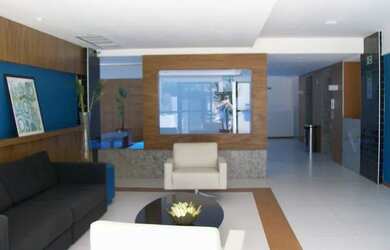 Imagem 2: Quarto e sala com vista para o mar da praia de Cruz das Almas