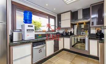 Imagem 4: CA0331 - Casa à Venda no São Lourenço 3 Quartos Suíte Piscina 4 Vagas Curitiba PR