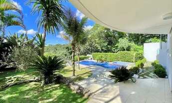 Imagem 2: Casa de 410m² com 4 quartos sendo 2 suíte, 5 banheiros e 4 vagas de garagem no Parque das