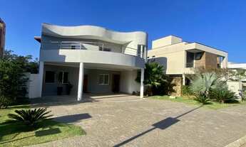 Imagem 4: Casa de condomínio para aluguel e venda possui 420 metros quadrados com 5 quartos