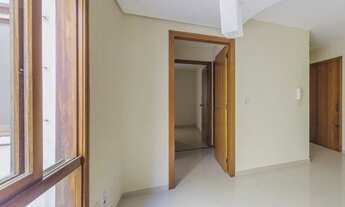 Imagem 2: Apartamento com 2 quartos e vaga coberta em Auxiliadora - Porto Alegre - RS