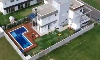 Imagem: Casa em condomínio fechado, com 4 suítes