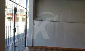 Imagem 2: Casa com 3 quartos, sala, cozinha, banheiro, área de serviço, 2 vagas de garagem