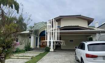 Imagem: Casa com 4 suítes, 4 vagas, sala com 3