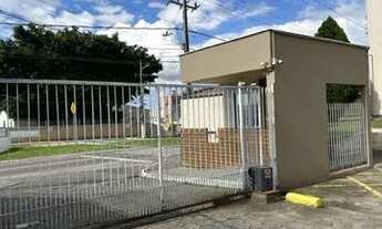 Imagem 1: Apto 02 dormitórios todo em piso com 01 cama box, sala com mesa com 04 cadeiras, 01 sofá d