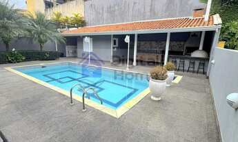 Imagem 3: Excelente casa com 4 suites, linda área gourmet com churrasqueira e piscina+ 4 vagas de ga