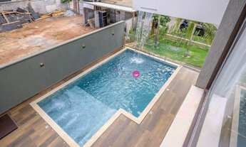 Imagem 2: Explore o luxo e a exclusividade deste sobrado de alto padrão, localizado na parte mais pr