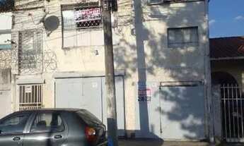 Imagem 2: CASA COM DUAS VAGAS DE GARAGEM E BARRACÕES NO FUNDO