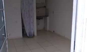 Imagem: Quitinete suíte com pia de pratos e lavanderia