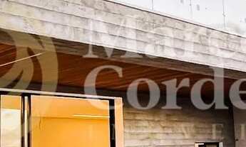 Imagem 2: Casa na Cidade Alpha fachada em arquitetura Modernista em traços retos. Eusébio