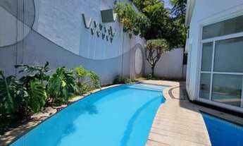 Imagem 5: Linda Casa com 4 Suites, area de lazer com piscina e churrasqueira no Alphaville Residenci