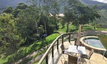 Imagem 6: Casa de condomínio para venda possui 350 metros quadrados com 5 quartos