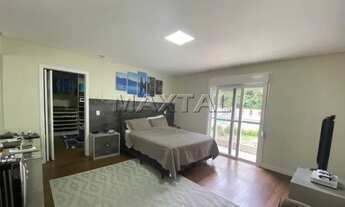 Imagem 2: Casa em condomínio, 4 dormitórios, sendo 3 suítes e com 8 vagas . Alto padrão