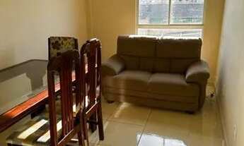 Imagem 5: Apto 02 dormitórios todo em piso com 01 cama box, sala com mesa com 04 cadeiras, 01 sofá d