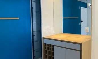 Imagem 4: Apartamento semimobiliado com vista parcial para o mar, 2 dormitórios sendo 1 suíte, 1 va