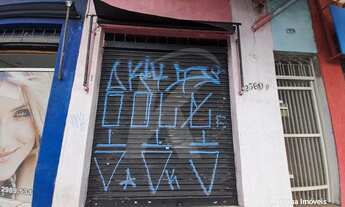 Imagem 5: Salão comercial com banheiro e porta de aço