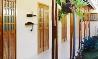 Imagem: Quarto com banheiro individual 1 vaga