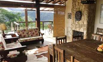 Imagem 2: Casa de condomínio para venda possui 350 metros quadrados com 5 quartos