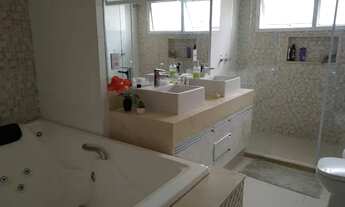 Imagem 6: Casa de condomínio para venda possui 340 metros quadrados com 4 quartos