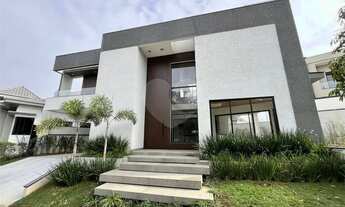 Imagem: Casa à venda com 4 quartos, sendo 4 suítes