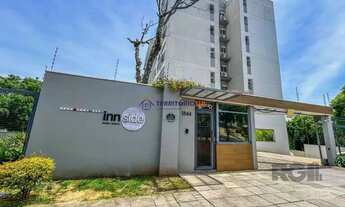 Imagem 1: Apartamento de 2 dormitórios, living, cozinha planejada, área de serviço, banheiro social