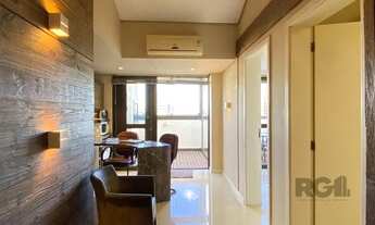 Imagem 7: Sala mobiliada, com churrasqueira para happy hour e vista para o Guaíba