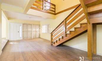 Imagem 2: Casa a venda com 4 quartos no bairro Vila Nova - Porto Alegre - RS