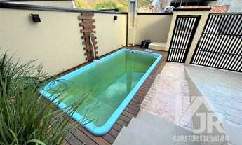 Imagem 4: Casa de alto padrão com piscina e suites