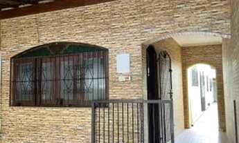 Imagem 2: Casa para venda com 150 metros quadrados com 2 quartos em Guilhermina - Praia Grande - SP
