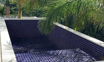 Imagem 5: Casa de condomínio para venda possui 550 metros quadrados com 4 quartos