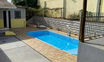 Imagem 4: Casa à Venda com Piscina e Terreno Amplo de 390m² Conforto e Lazer em Localização Tranqui