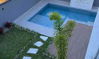 Imagem 2: Casa em condomínio com 4 suítes e 4 vagas de garagem em Camboriú/SC