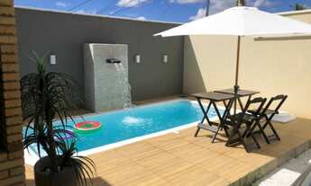 Imagem 6: Casa com piscina e móveis projetados para venda com 103 metros quadrados com 3 quartos em