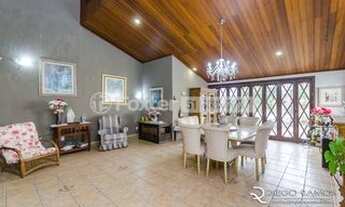 Imagem 2: Casa de condomínio para venda tem 385 metros quadrados com 3 quartos