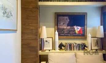 Imagem 6: Sala mobiliada, com churrasqueira para happy hour e vista para o Guaíba