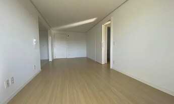 Imagem 3: Apartamento mobiliado de 2 dormitórios sendo 1 suíte, living com 2 ambientes, espera para