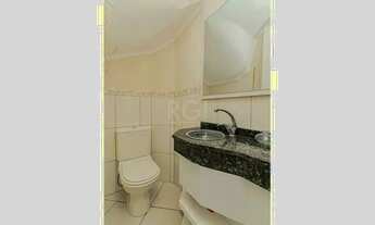 Imagem 5: Casa de três dormitórios, suíte e duas vagas de garagem no bairro Jardim Itu em Porto Aleg