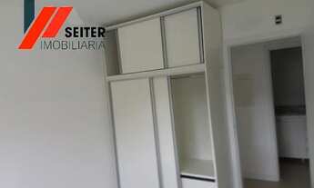 Imagem 6: Apartamento de 2 dormitórios com suite semi mobiliado e sacada com churrasqueira