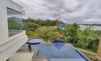 Imagem 2: Casa de condomínio para venda tem 882 metros quadrados com 8 quartos.