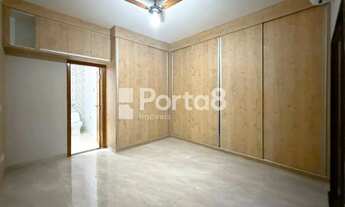 Imagem 4: Casa no Damha Fit com cozinha equipada e espaço gourmet com churrasqueira