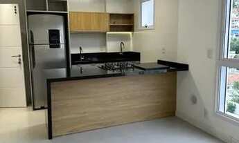 Imagem 6: Excelente studio (kitnet) novo com cozinha com pia, tanque, armários embutidos, geladeira