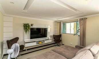 Imagem 7: Casa dos Sonhos em Condomínio Completo: 4 Suítes, Piscina e Área Gourmet!