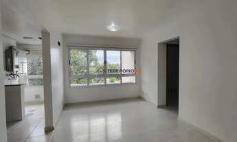 Imagem 2: Apartamento de 2 dormitórios, living, cozinha planejada, área de serviço, banheiro social