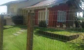 Imagem: Venda de casa com dois terrenos