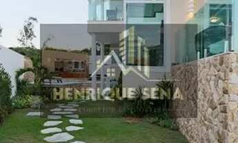 Imagem 6: Casa de condomínio para venda possui 400 metros quadrados com 6 quartos