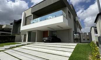 Imagem 2: Casa de Luxo com Vista Privilegiada e 5 suítes em Condomínio