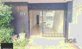 Imagem 4: Sala de frente com vaga