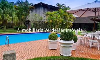 Imagem 2: Casa térrea à venda no Jardim Acapulco na praia de Pernambuco Guarujá