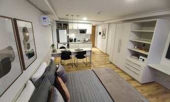 Imagem 4: Flat Suíte Confortável com Cama Queen e Cozinha Americana